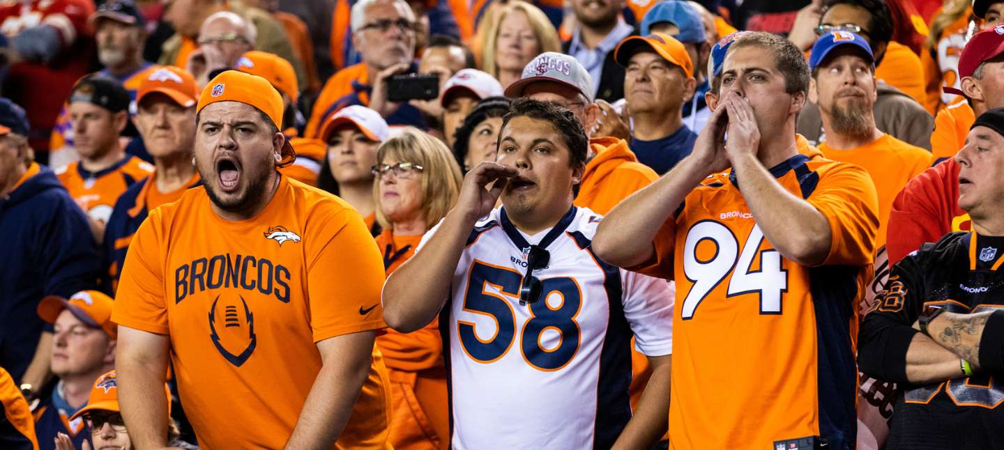 Denver Broncos fans cheering on a game