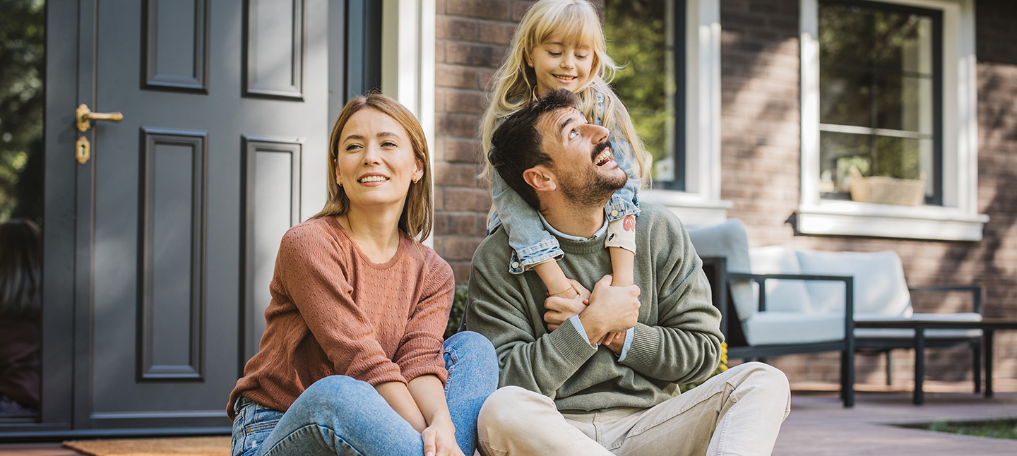 Young family enjoying in sunny day