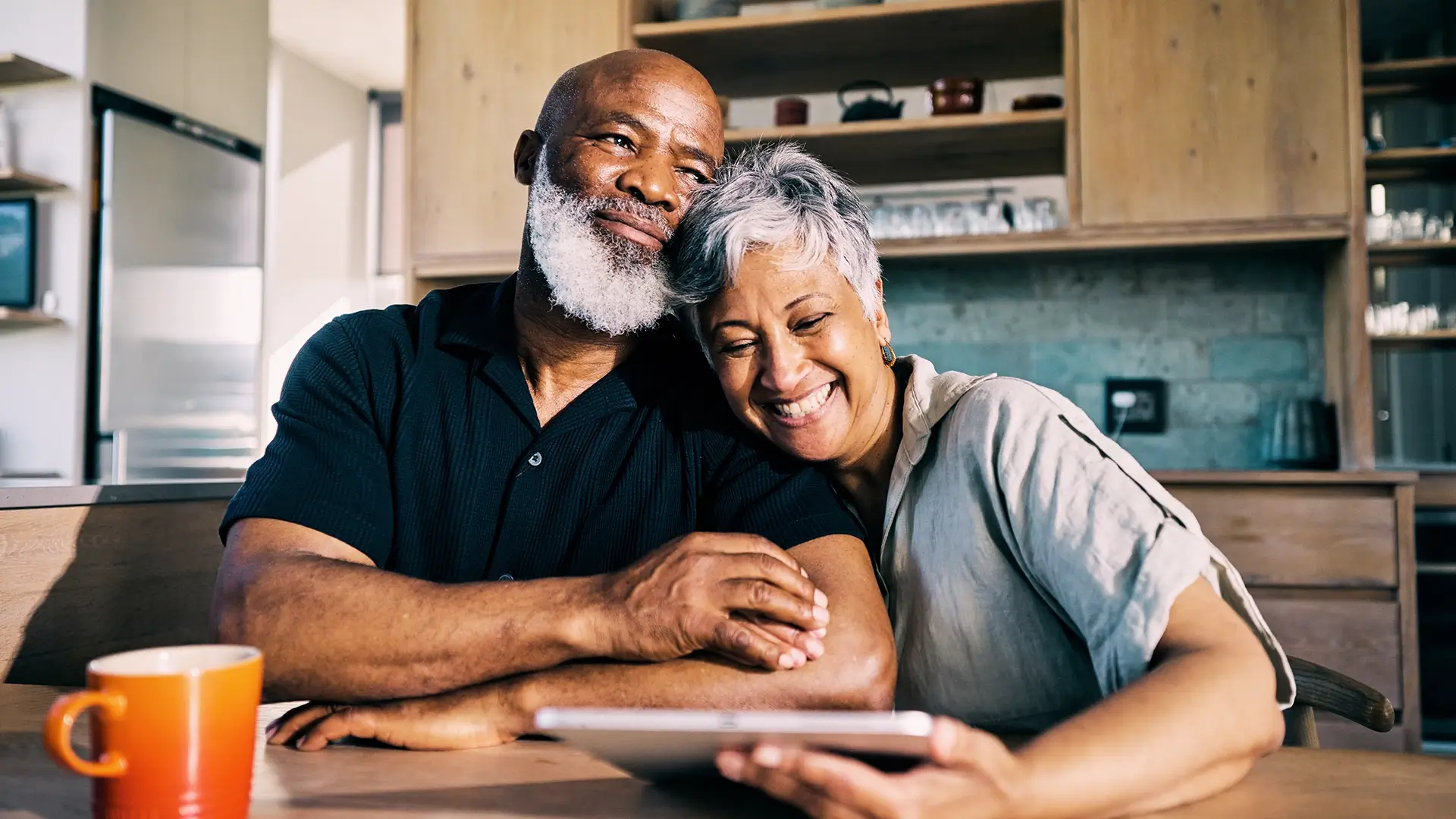 An older couple spending time at home updating their finances